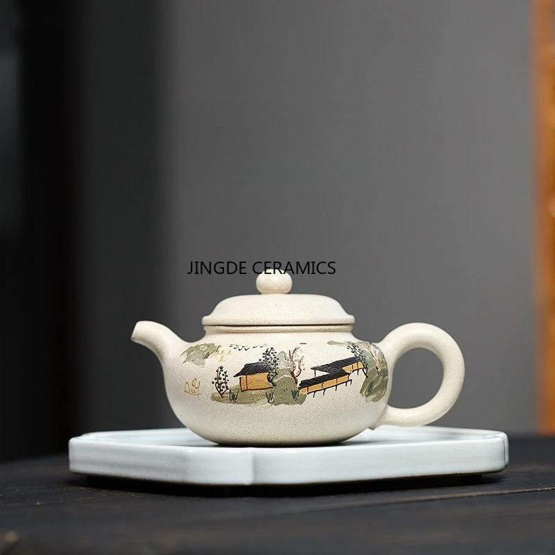 Чайник из исинской глины ручной работы, в античном стиле, с пейзажным рисунком, для заваривания чая, аксессуар для чайной церемонии
Чайник из исинской глины ручной работы, в античном стиле, с пейзажным рисунком, для заваривания чая, аксессуар для чайной церемонии