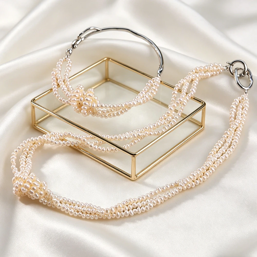 White Freshwater Pearl Knotting Clasp Necklace Bracelet Set for Women Fashion Multilayer Choker Jewelry Original Handmade Design
White Freshwater Pearl Knotting Clasp Necklace Bracelet Set for Women Fashion Multilayer Choker Jewelry Original Handmade Design
