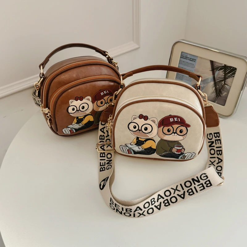 2026 women's crossbody bag cartoon women's shoulder bag wide shoulder strap handbag fashionable crossbody bag large capacity bag
2026 women's crossbody bag cartoon women's shoulder bag wide shoulder strap handbag fashionable crossbody bag large capacity bag