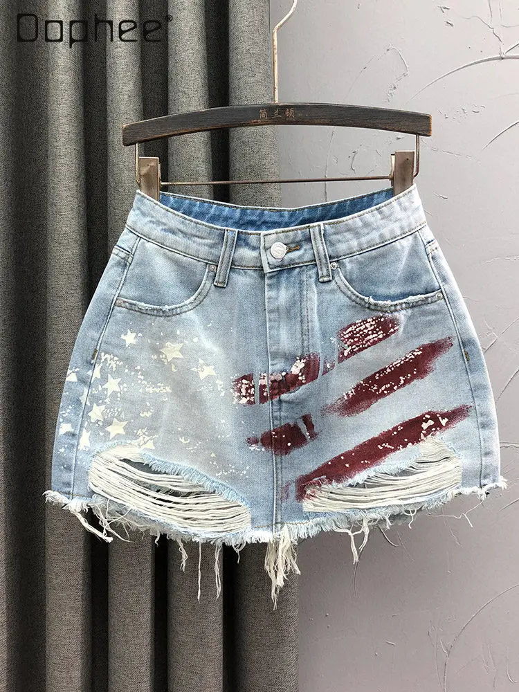 Street Personality Retro Printing Ripped Denim Skirt Women's 2026 New Summer Fashion High Waist Slim A-shaped Sexy Mini Skirt
Street Personality Retro Printing Ripped Denim Skirt Women's 2026 New Summer Fashion High Waist Slim A-shaped Sexy Mini Skirt