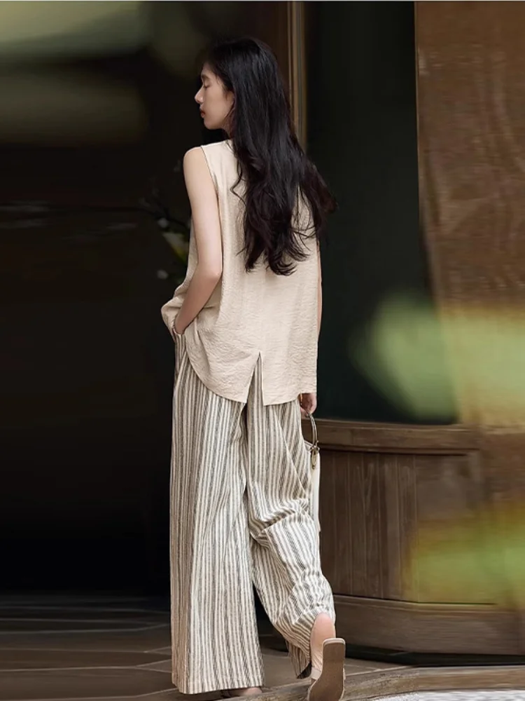 Flax Loose Pants 2 Piece Set Women Round Neck Sleeveless Split Tops Stripe Pattern Wide Leg Trousers 2025 Summer Street Outfits
Flax Loose Pants 2 Piece Set Women Round Neck Sleeveless Split Tops Stripe Pattern Wide Leg Trousers 2025 Summer Street Outfits
