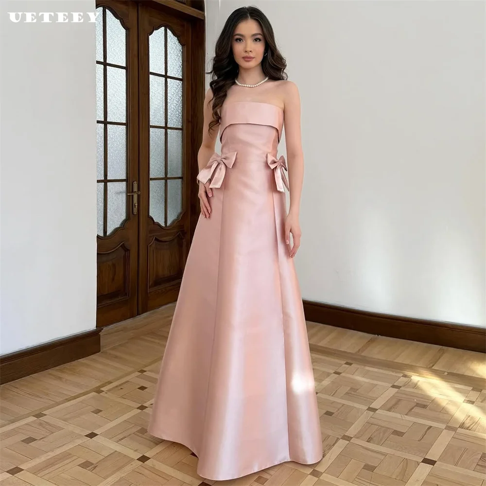 UETEEY Customized Elegant Strapless Bow Satin Sleeveless Satin A Line Prom Dress Party Lace Up Back Floor Length Evening Gown
UETEEY Customized Elegant Strapless Bow Satin Sleeveless Satin A Line Prom Dress Party Lace Up Back Floor Length Evening Gown