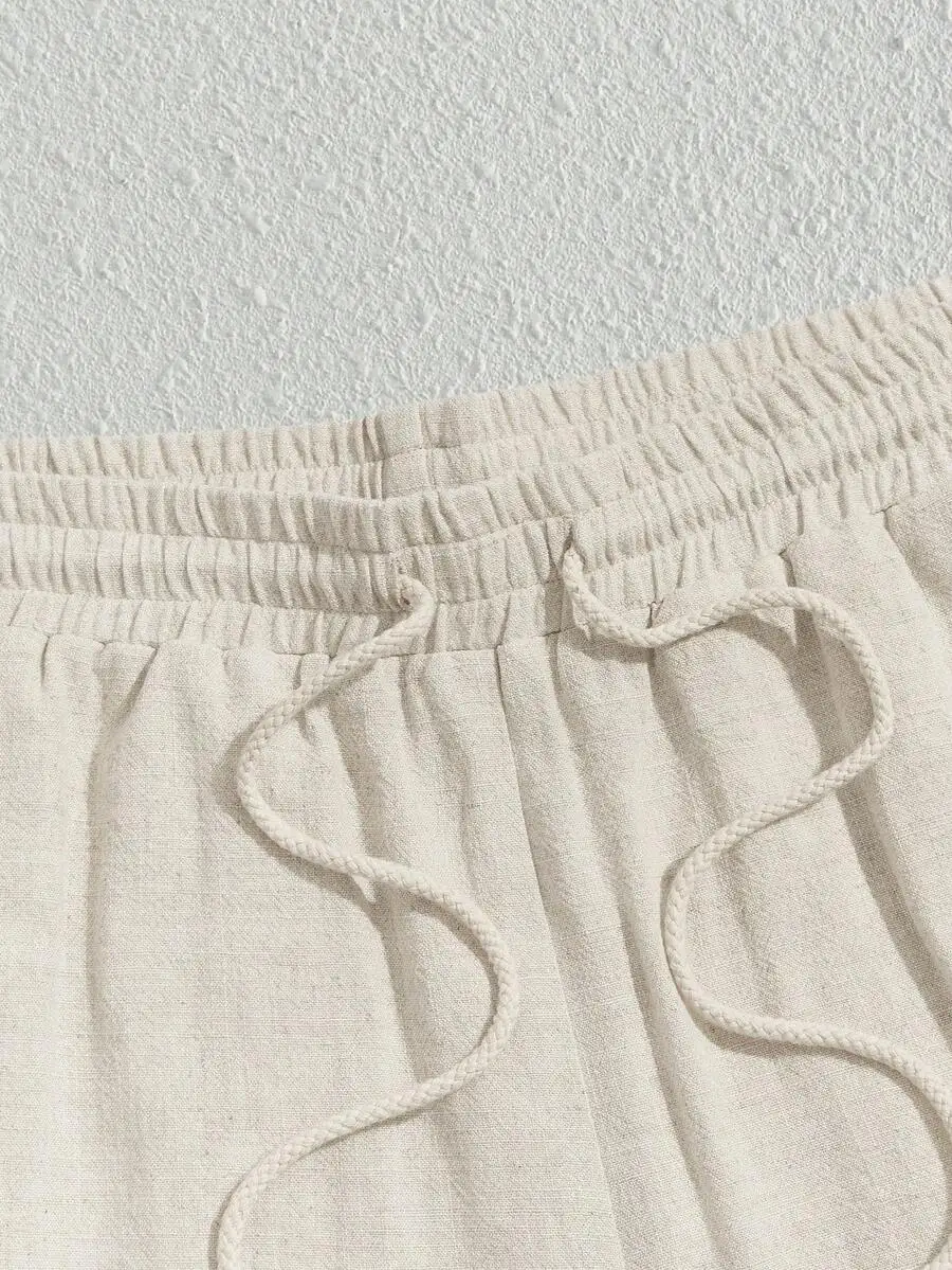 Loose Fit Solid Color Drawstring Waist Shorts With Slanted Pocket
Loose Fit Solid Color Drawstring Waist Shorts With Slanted Pocket