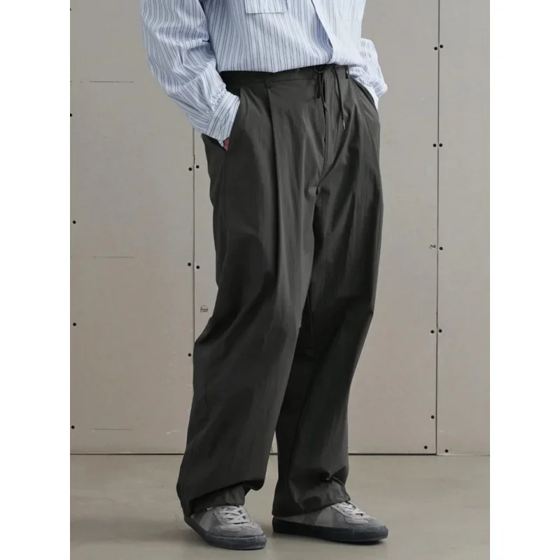 24SS retro Japanese drawstring elastic waist straight loose pleated gray casual pants
24SS retro Japanese drawstring elastic waist straight loose pleated gray casual pants