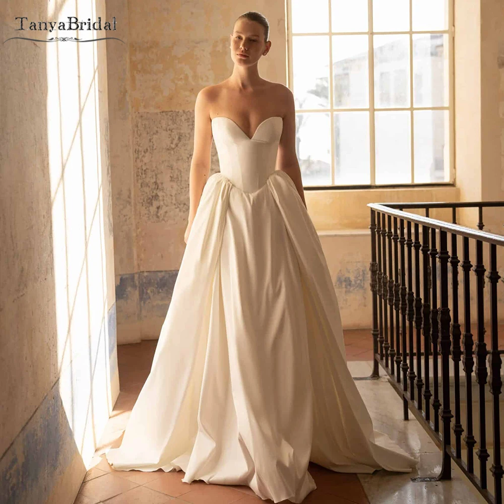 Princess Wedding DressFeaturing A Strapless Corset . Enhanced With Bow-Shaped Off-shoulder Sleeves,Bridal Gowns DW996
Princess Wedding DressFeaturing A Strapless Corset . Enhanced With Bow-Shaped Off-shoulder Sleeves,Bridal Gowns DW996