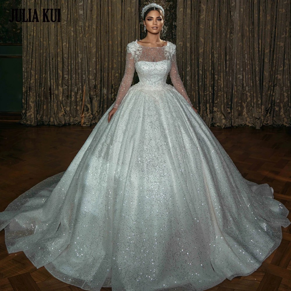 Julia Kui Customize Bling Lace O-Neck Ball Gown Wedding Dress Beading Pearls Appliques Lace Full Sleeves Princess Bridal Skirt
Julia Kui Customize Bling Lace O-Neck Ball Gown Wedding Dress Beading Pearls Appliques Lace Full Sleeves Princess Bridal Skirt