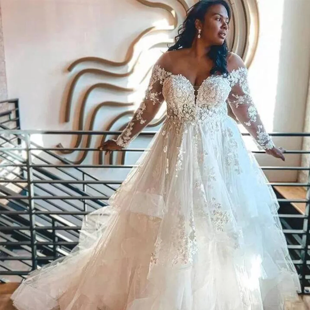 Customized ZJ9310 Plus Size Wedding Gowns Elegant Long Sleeves Lace Bride Dress Tulle Applique
Customized ZJ9310 Plus Size Wedding Gowns Elegant Long Sleeves Lace Bride Dress Tulle Applique