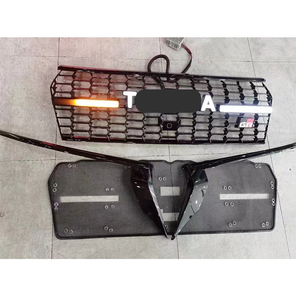Новая передняя решетка для Toyota Land Prado 2018-2021, обновление до передней решетки FJ200 в стиле GR с подвижным светодиодом
Новая передняя решетка для Toyota Land Prado 2018-2021, обновление до передней решетки FJ200 в стиле GR с подвижным светодиодом