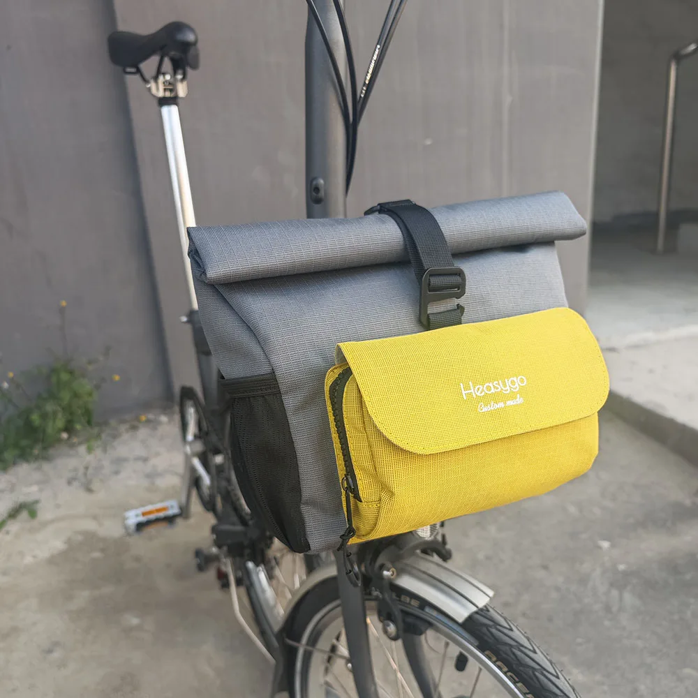 Heasygo Waterproof Bicycle Front Storage Bag with Pig Nose Adapter for Brompton, Folding Bike Multifunctional 5-7L Handlebar Bag
Heasygo Waterproof Bicycle Front Storage Bag with Pig Nose Adapter for Brompton, Folding Bike Multifunctional 5-7L Handlebar Bag