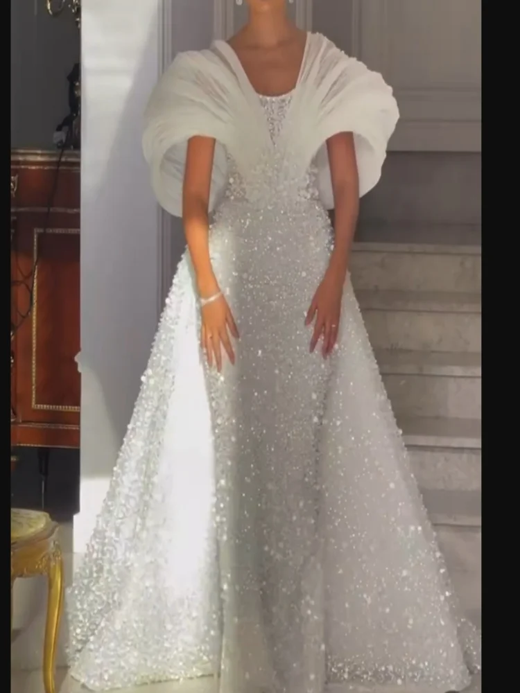 Customized Off the Shoulder Sparkly Heavy Beads Pearls Wedding Dress Vestidos De Novia Luxury Bridal Gowns with Removable Skirt
Customized Off the Shoulder Sparkly Heavy Beads Pearls Wedding Dress Vestidos De Novia Luxury Bridal Gowns with Removable Skirt
