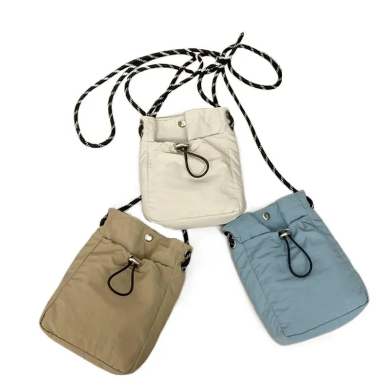 Nylon Drawstring Mobile Phone Bag Casual Shoulder Crossbody Bags Fashion Purse Small Pouch
Nylon Drawstring Mobile Phone Bag Casual Shoulder Crossbody Bags Fashion Purse Small Pouch
