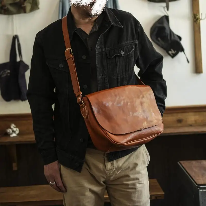 Simple vintage handmade first layer cowhide men's messenger bag fashion casual travel luxury genuine leather shoulder bag
Simple vintage handmade first layer cowhide men's messenger bag fashion casual travel luxury genuine leather shoulder bag