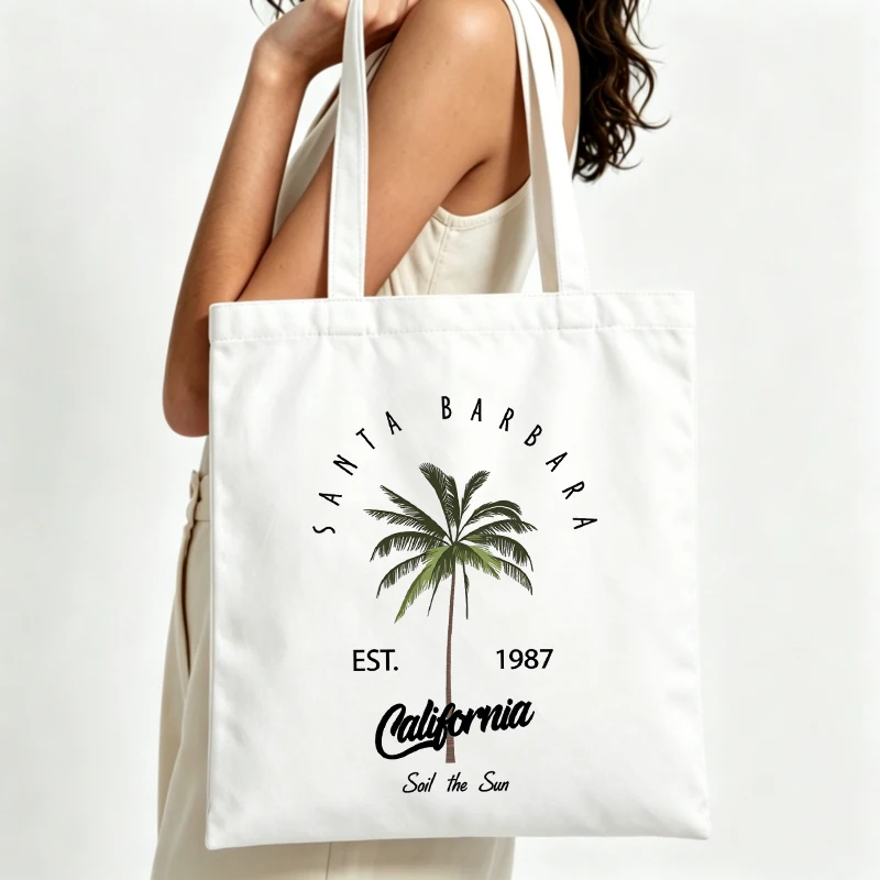 Women's palm tree and typography print canvas tote bag, vintage style for summer shopping and casual outings
Women's palm tree and typography print canvas tote bag, vintage style for summer shopping and casual outings