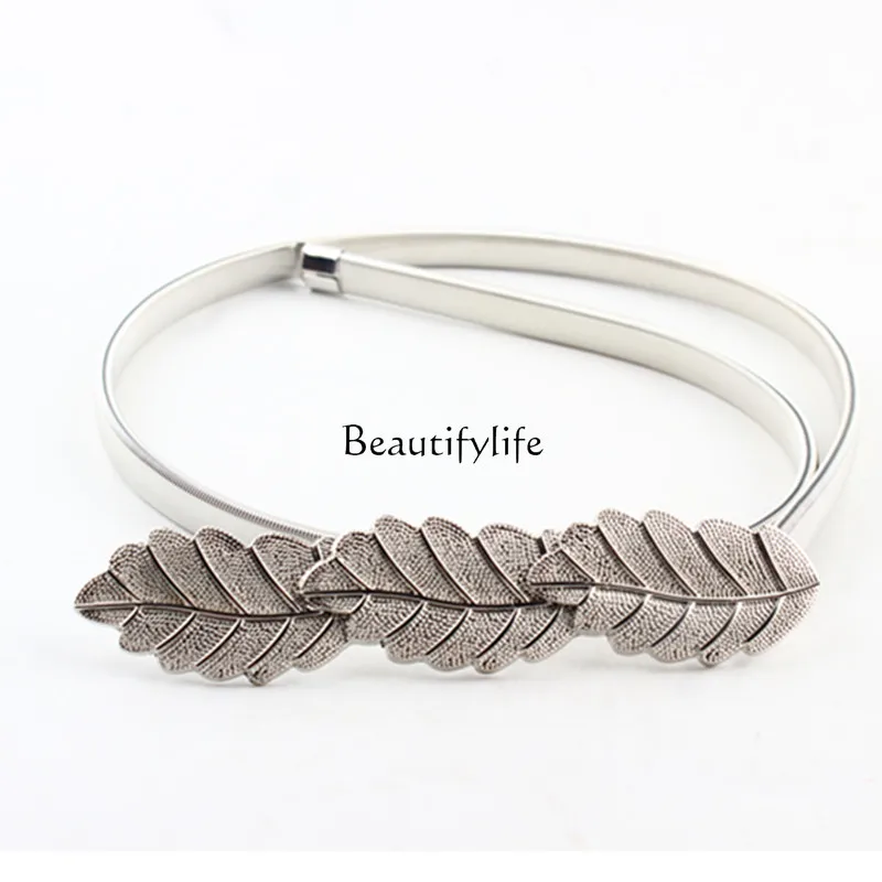 Belt European and American metal leaf decoration belt elastic spring waist chain dress with accessories
Belt European and American metal leaf decoration belt elastic spring waist chain dress with accessories