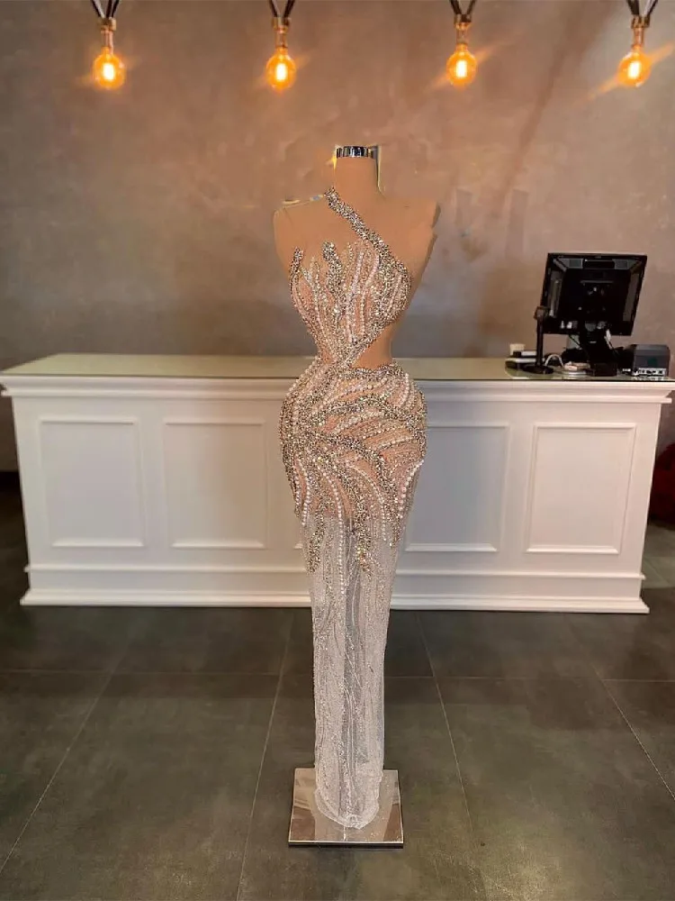 Sexy Mermaid Evening Dresses V Neck Sleeveless One Shoulder Sequins Pearls Lace Hollow Beaded Appliques Prom Dresses Custom Made
Sexy Mermaid Evening Dresses V Neck Sleeveless One Shoulder Sequins Pearls Lace Hollow Beaded Appliques Prom Dresses Custom Made