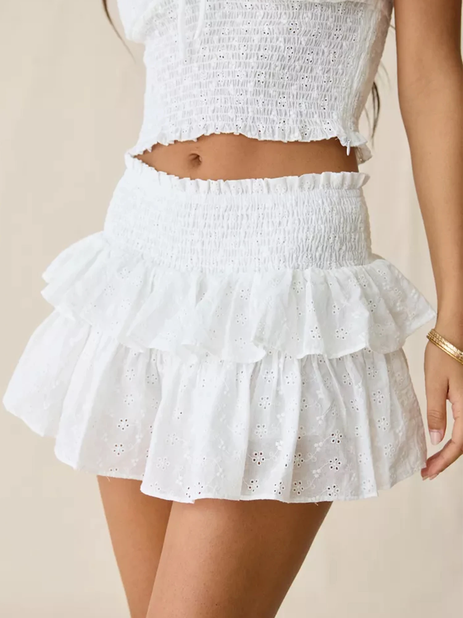 2026 Women's Eyelet Cotton Mini Skirt Summer White Smocked High Waisted Short Skirts with Tiered Ruffle Hem for Beach Vacation
2026 Women's Eyelet Cotton Mini Skirt Summer White Smocked High Waisted Short Skirts with Tiered Ruffle Hem for Beach Vacation