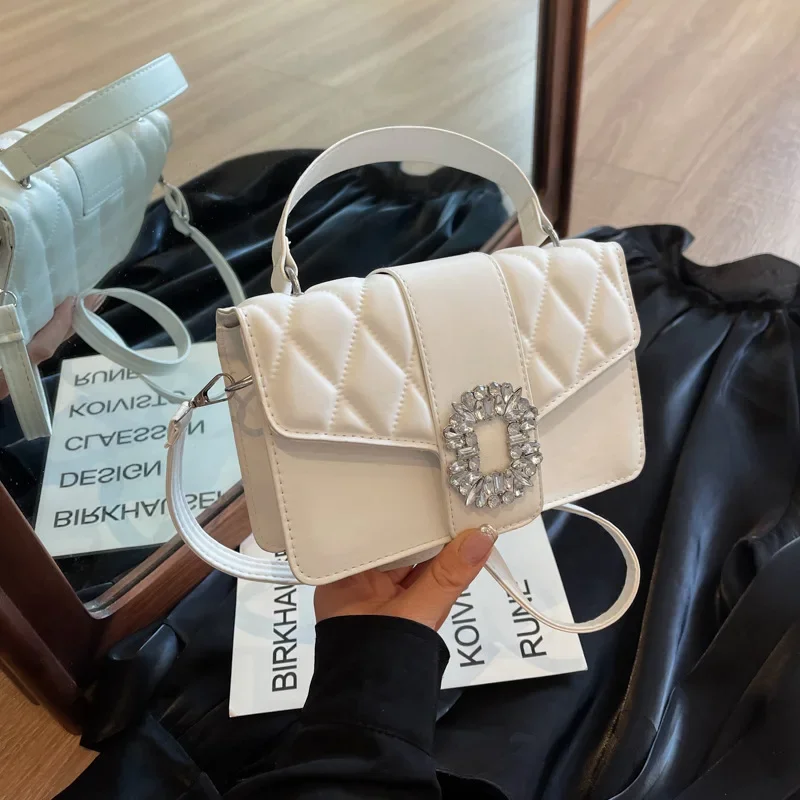 fashionable versatile diamond-encrusted shoulder messenger bag high-end texture light school bags
fashionable versatile diamond-encrusted shoulder messenger bag high-end texture light school bags