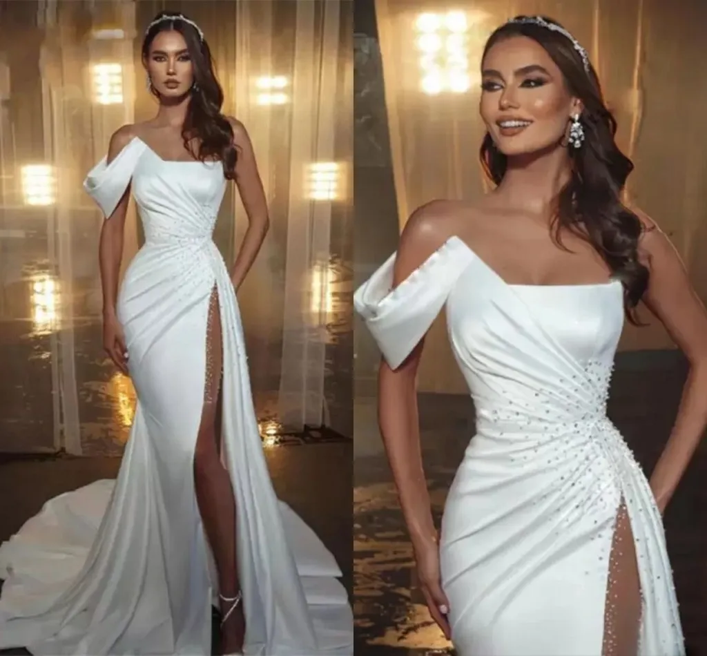 Elegant Mermaid Wedding Dresses 2025 Thigh High Slits One Shoulder Pearls Satin Bridal Gown Vestido De Noiva Robe Mariage
Elegant Mermaid Wedding Dresses 2025 Thigh High Slits One Shoulder Pearls Satin Bridal Gown Vestido De Noiva Robe Mariage
