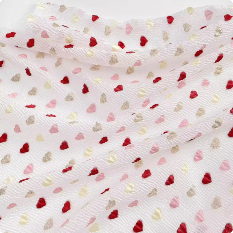 Colorful heart-shaped polka dot pattern jacquard bubble fabric for women's and children's clothing polyester fabric
Colorful heart-shaped polka dot pattern jacquard bubble fabric for women's and children's clothing polyester fabric