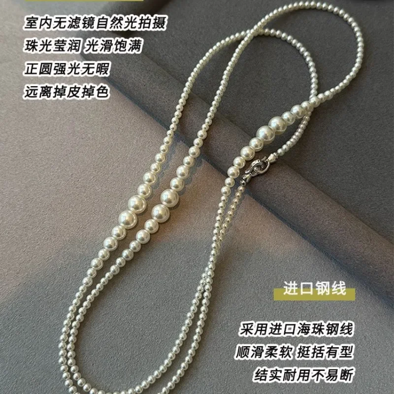 Double-layer Stacked Long Pearl Necklace with Millet Beads, New Niche Sweater Chain, Light Luxury and High-end Neck Chain for Wo
Double-layer Stacked Long Pearl Necklace with Millet Beads, New Niche Sweater Chain, Light Luxury and High-end Neck Chain for Wo