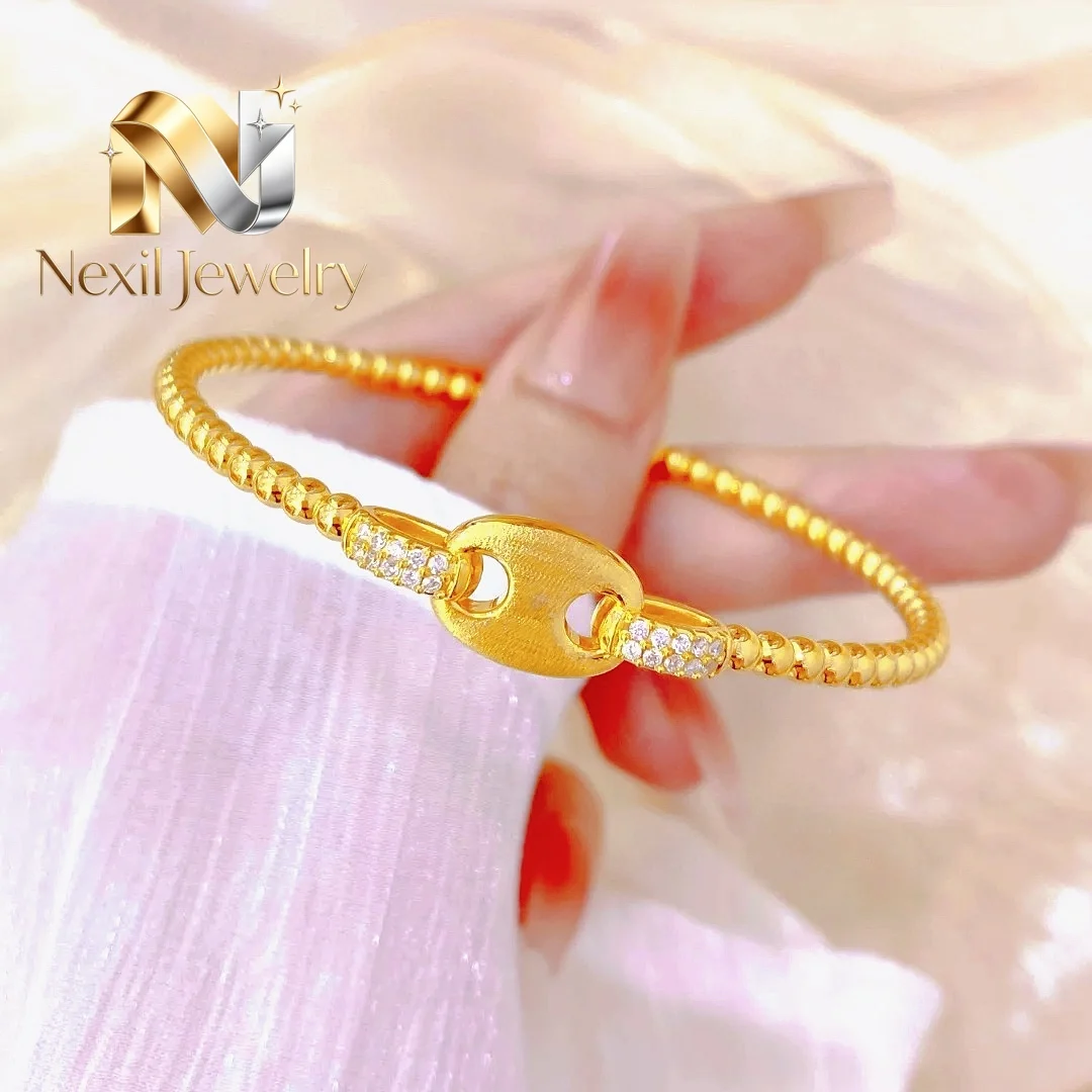 Nexil Jewelry Nexil Jewelry Pig Nose Bangle Women's 24K Gold AU999 - Dynamic slim pig nose bangle, minimalist and timeless, f
Nexil Jewelry Nexil Jewelry Pig Nose Bangle Women's 24K Gold AU999 - Dynamic slim pig nose bangle, minimalist and timeless, f