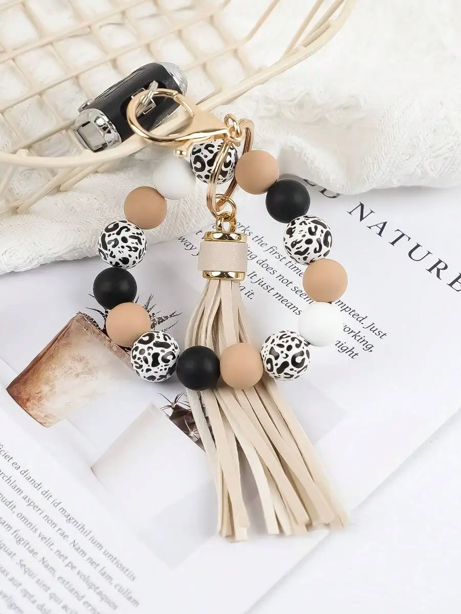Leopard Print Wood And Silicone Bead PU Tassel Keychain Bag Charm Car Accessory
Leopard Print Wood And Silicone Bead PU Tassel Keychain Bag Charm Car Accessory