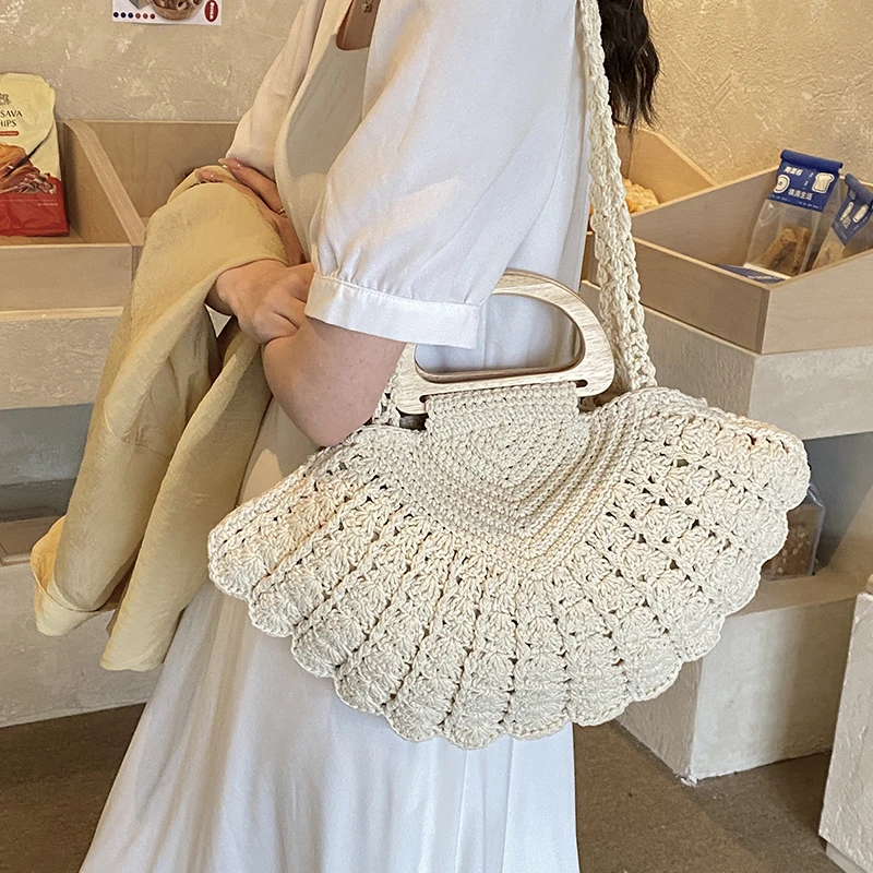 2026 New Retro Fan-shaped Crochet Woven Underarm Bag for Women Ins Style Seaside Vacation Versatile Wooden Handle Shoulder Bag
2026 New Retro Fan-shaped Crochet Woven Underarm Bag for Women Ins Style Seaside Vacation Versatile Wooden Handle Shoulder Bag