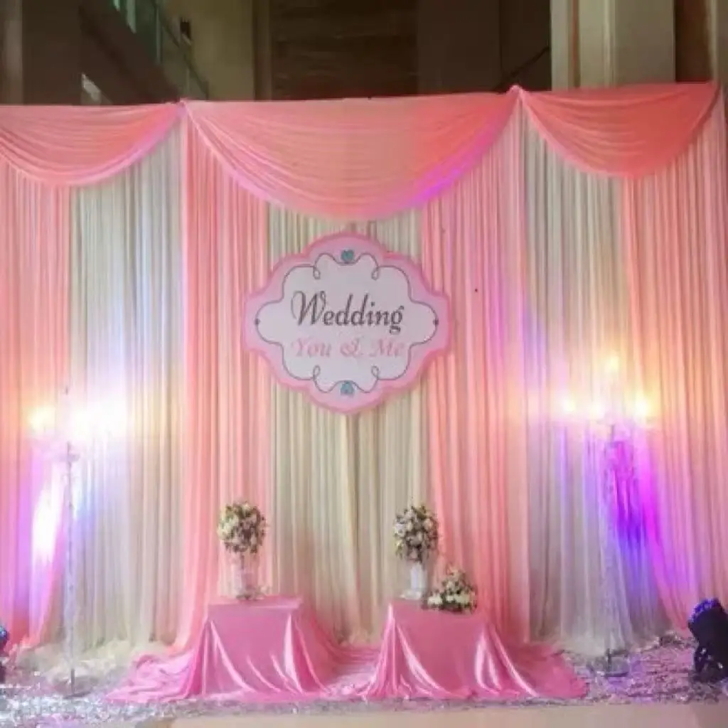 10X10/10X20ft White Ice Silk Backdrop with Pink Swags Wedding Party Stage Background Decoration Church Stage Curtain Backdrops
10X10/10X20ft White Ice Silk Backdrop with Pink Swags Wedding Party Stage Background Decoration Church Stage Curtain Backdrops