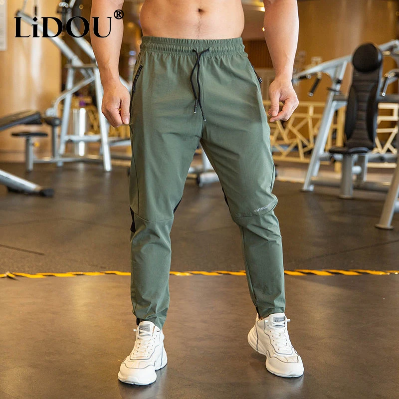 2026 Summer Thin Style Ice Silk Fabric Motion Trousers Man Solid Color Elastic Waist Quick Drying Loose Bodybuilding Sweatpants
2026 Summer Thin Style Ice Silk Fabric Motion Trousers Man Solid Color Elastic Waist Quick Drying Loose Bodybuilding Sweatpants