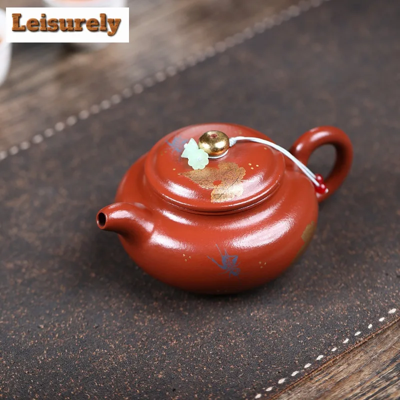 260ml Handmade Yixing Purple Clay Teapots Handmade Maple Leaf Gold Drawing Antique Pot Raw Ore Zhu Mud Kettle Zisha Tea Set Gift
260ml Handmade Yixing Purple Clay Teapots Handmade Maple Leaf Gold Drawing Antique Pot Raw Ore Zhu Mud Kettle Zisha Tea Set Gift