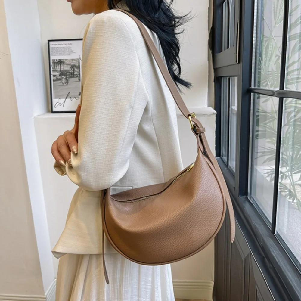 Solid Color PU Leather Crossbody Bag Zipper Korean Style PU Leather Shoulder Bag Handbag Adjustable Strap Underarm Dumpling Bag
Solid Color PU Leather Crossbody Bag Zipper Korean Style PU Leather Shoulder Bag Handbag Adjustable Strap Underarm Dumpling Bag