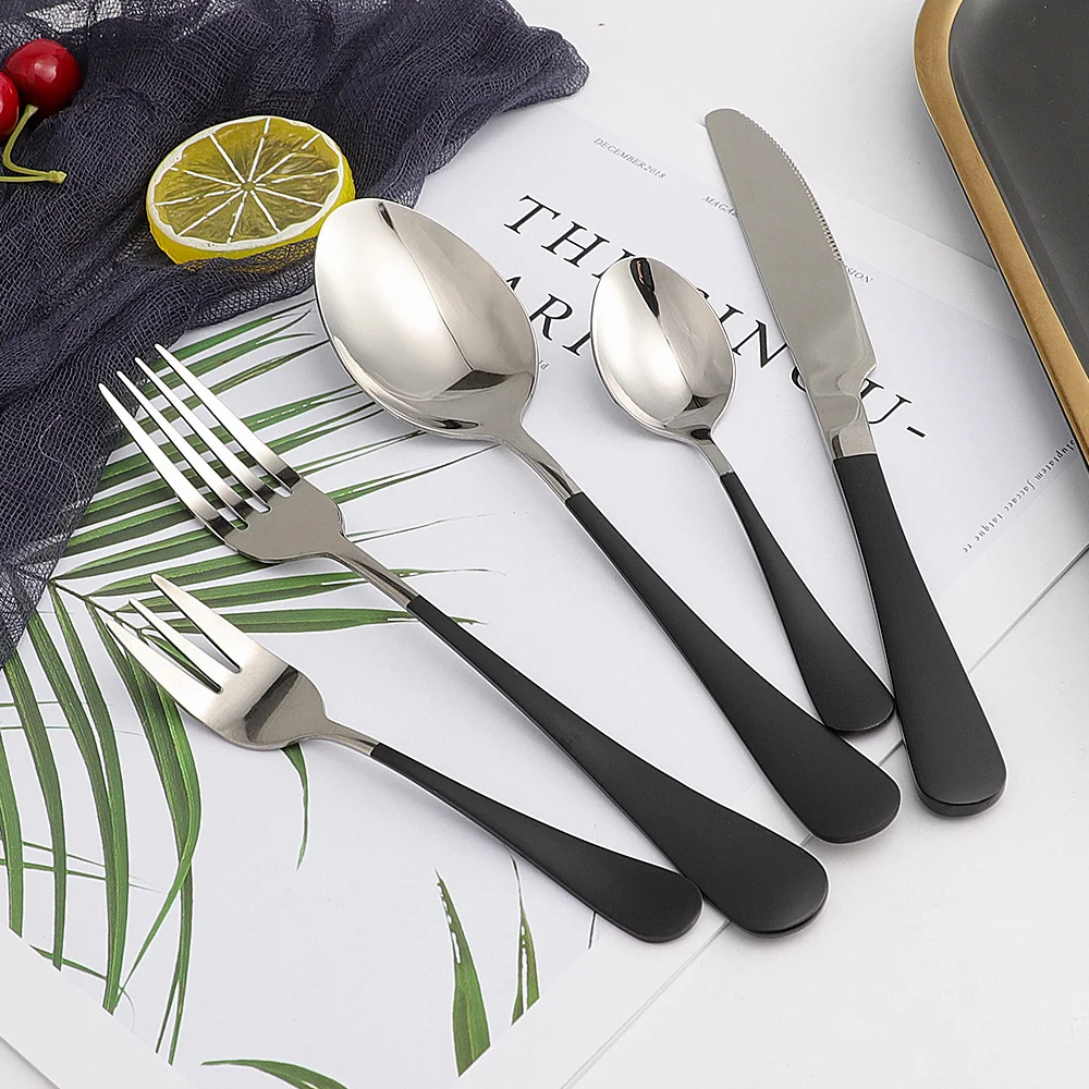 Black Handle Silver Stainless Steel Cutlery Set 20Pcs Tableware Dinner Dinnerware Set Creative Fork Knife Spoon Set Silverware
Black Handle Silver Stainless Steel Cutlery Set 20Pcs Tableware Dinner Dinnerware Set Creative Fork Knife Spoon Set Silverware