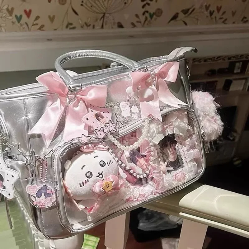 Y2k Эстетические серебряные сумки на плечо с бантом, модные милые кавайные прозрачные сумки подмышки, женские сумки в стиле Лолиты в консервативном стиле Ita
Y2k Эстетические серебряные сумки на плечо с бантом, модные милые кавайные прозрачные сумки подмышки, женские сумки в стиле Лолиты в консервативном стиле Ita