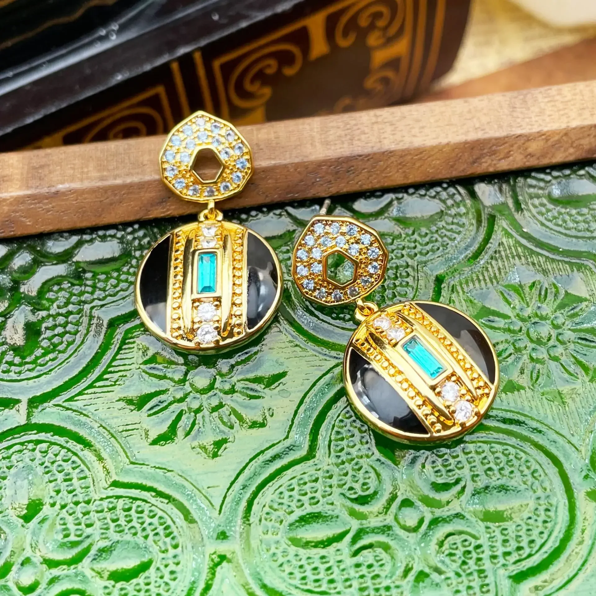 European and American retro new geometric drop glaze inlaid zircon earrings for women
European and American retro new geometric drop glaze inlaid zircon earrings for women