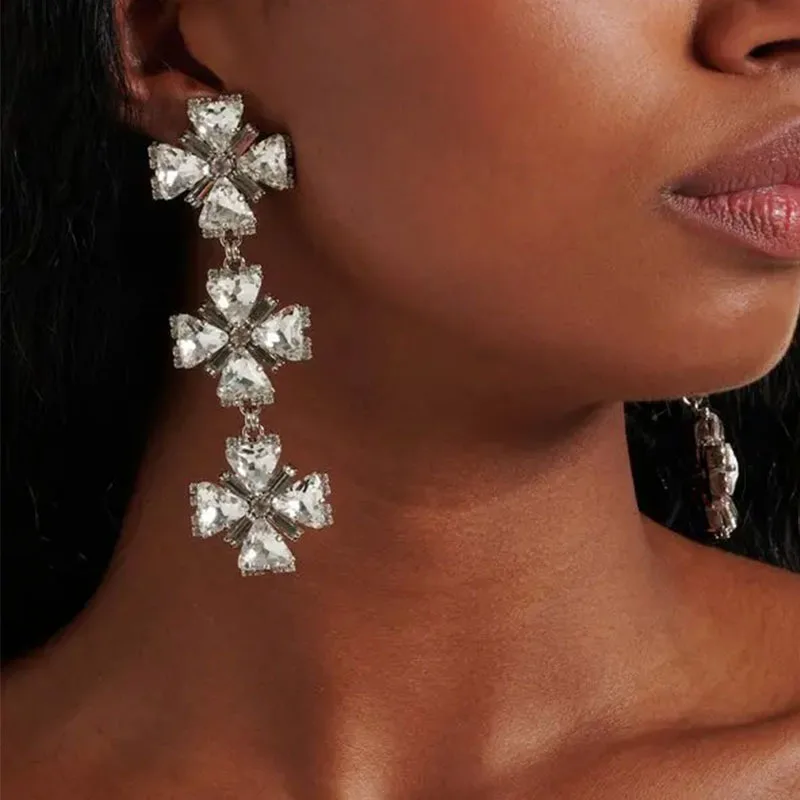 Элегантные серьги-подвески со стразами и треугольными четырьмя листами, женские модные украшения, свадебные аксессуары, роскошный стиль, зажим для ушей
Элегантные серьги-подвески со стразами и треугольными четырьмя листами, женские модные украшения, свадебные аксессуары, роскошный стиль, зажим для ушей