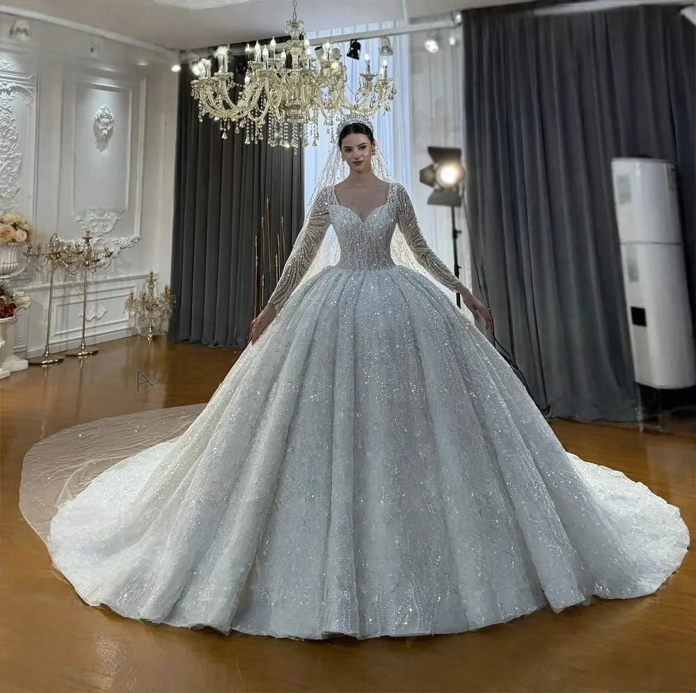 Customized Gorgeous Long Sleeves Wedding Dress For Women Sequins Appliques Bridal Gown high-Neck Bridal dress Vestido De Novia
Customized Gorgeous Long Sleeves Wedding Dress For Women Sequins Appliques Bridal Gown high-Neck Bridal dress Vestido De Novia