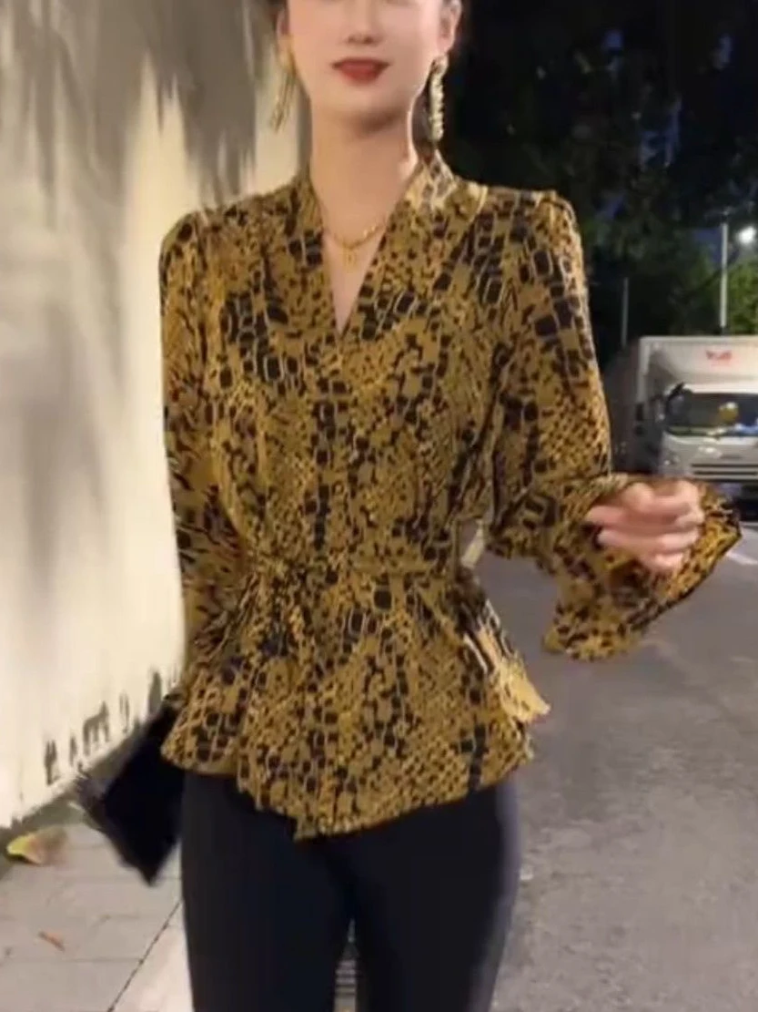 Корейский Sle Гонконг Sle с цветочным принтом и поясом Bell Sve irt, женский осенний новый винтажный повседневный топ из полиэстера
Корейский Sle Гонконг Sle с цветочным принтом и поясом Bell Sve irt, женский осенний новый винтажный повседневный топ из полиэстера