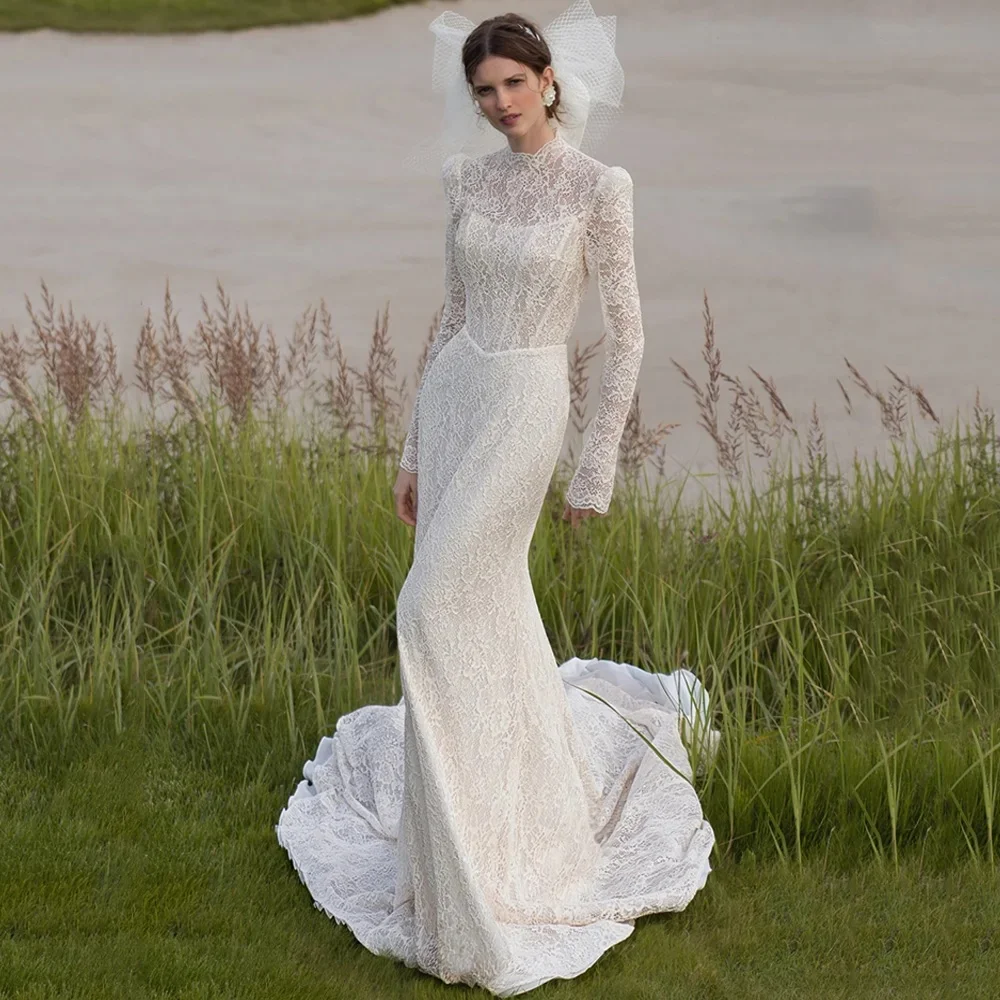 Полный кружевной платье русалки Vestidos De Novia по индивидуальному заказу с высоким воротником и длинными рукавами, с открытой спиной, свадебные платья, аппликации, Vestido De Noiva
Полный кружевной платье русалки Vestidos De Novia по индивидуальному заказу с высоким воротником и длинными рукавами, с открытой спиной, свадебные платья, аппликации, Vestido De Noiva