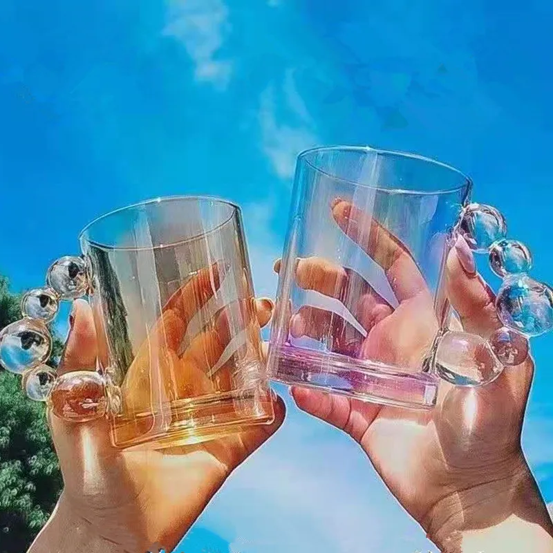 Iridescent Glass Cup Coffee Mug Big Ball Handle Transparent Glass Water Cup Mugs Dessert Coffee Water Cups Drinkware Tableware
Iridescent Glass Cup Coffee Mug Big Ball Handle Transparent Glass Water Cup Mugs Dessert Coffee Water Cups Drinkware Tableware