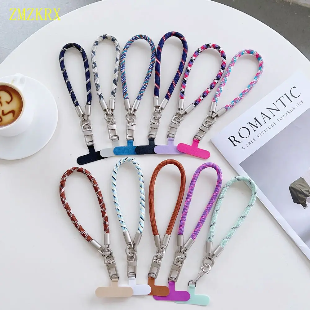 Новый портативный ремешок на запястье для мобильного телефона, нейлоновый красочный ремешок против падения с язычками на привязках, съемный подвесной шнур для мобильного телефона
Новый портативный ремешок на запястье для мобильного телефона, нейлоновый красочный ремешок против падения с язычками на привязках, съемный подвесной шнур для мобильного телефона