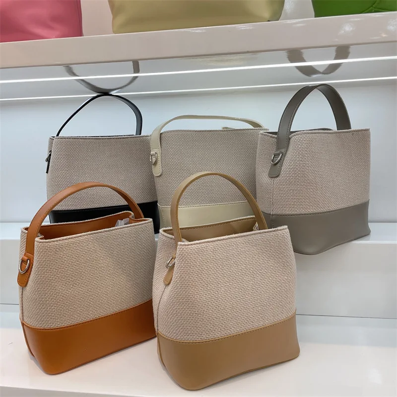 Fashionable women's contrasting color spliced bucket bag niche simple crossbody versatile single shoulder woven leather
Fashionable women's contrasting color spliced bucket bag niche simple crossbody versatile single shoulder woven leather