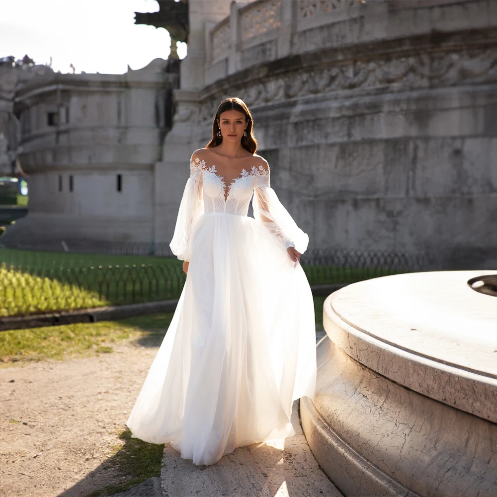 V-neck Flower Appliques Wedding Dress with Long Puff Sleeves Chiffon A-line Court Wedding Gowns for Bridal فساتين السهرة
V-neck Flower Appliques Wedding Dress with Long Puff Sleeves Chiffon A-line Court Wedding Gowns for Bridal فساتين السهرة
