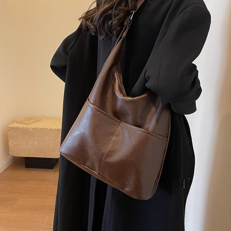 Модная сумка-мешок под мышками, большая пригородная сумка Capaci, сумка через плечо на одно плечо, корейская молодежная сумка с мягкой ручкой
Модная сумка-мешок под мышками, большая пригородная сумка Capaci, сумка через плечо на одно плечо, корейская молодежная сумка с мягкой ручкой