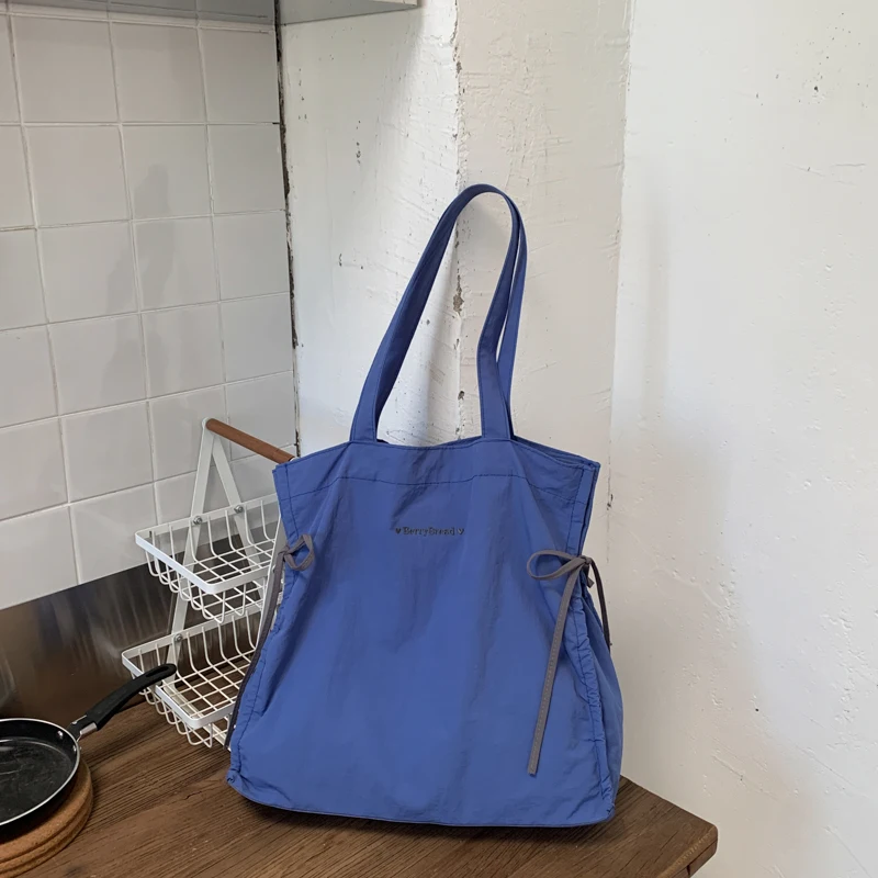 Women's Nylon Tote Bag, Large Capacity Shoulder Bag Drawstring Lightweight Handbag for Work, School, Travel and Daily Commute
Women's Nylon Tote Bag, Large Capacity Shoulder Bag Drawstring Lightweight Handbag for Work, School, Travel and Daily Commute