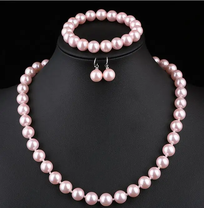 Красивое 10 мм AAA розовое жемчужное ожерелье-браслет и серьги
Красивое 10 мм AAA розовое жемчужное ожерелье-браслет и серьги