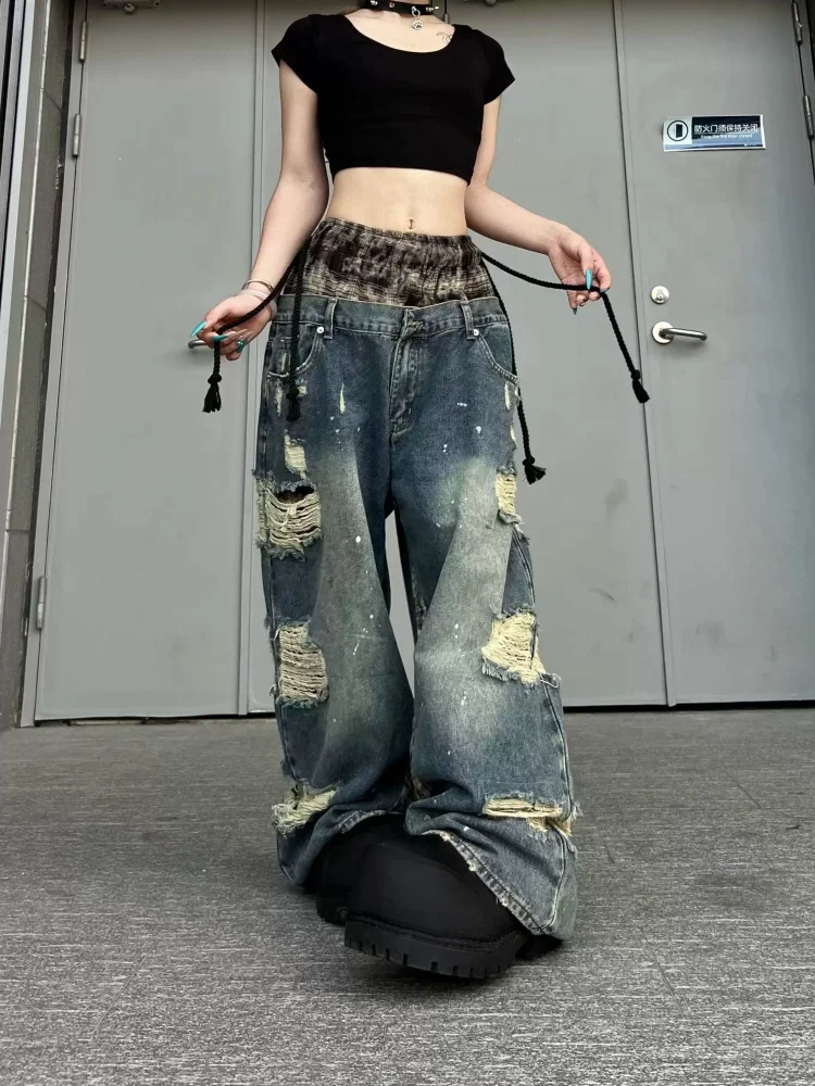 Джинсы унисекс в американском стиле с клетчатым пэчворком, двойным поясом, эффектом потертости и рваными элементами, широкие штанины, в стиле High Street
Джинсы унисекс в американском стиле с клетчатым пэчворком, двойным поясом, эффектом потертости и рваными элементами, широкие штанины, в стиле High Street