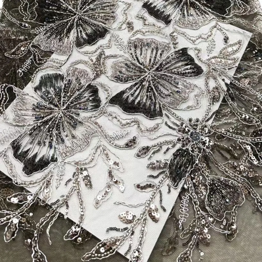 Elegant Sequins Beaded Floral Embroidered Lace Fabric High Quality Fabric Vertical For Sewing Blooms Delicate Garden Party Gown
Elegant Sequins Beaded Floral Embroidered Lace Fabric High Quality Fabric Vertical For Sewing Blooms Delicate Garden Party Gown