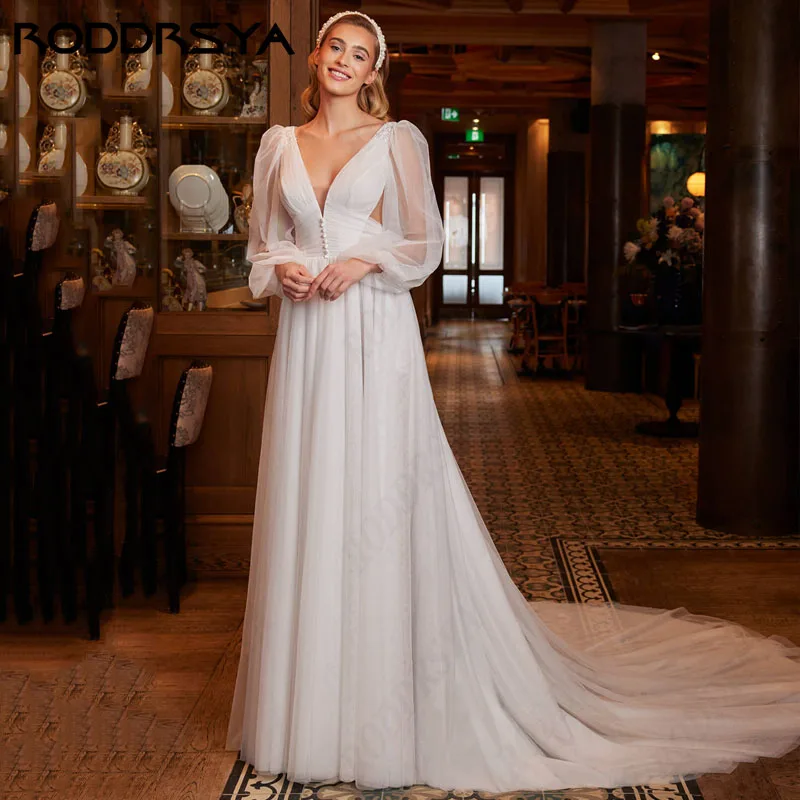 RODDRSYA Deep V-Neck Puff Long Sleeve Wedding Dress Elegant Lace A-line Robe De Soirée Sexy Backless Sweep Train Bridal Party
RODDRSYA Deep V-Neck Puff Long Sleeve Wedding Dress Elegant Lace A-line Robe De Soirée Sexy Backless Sweep Train Bridal Party