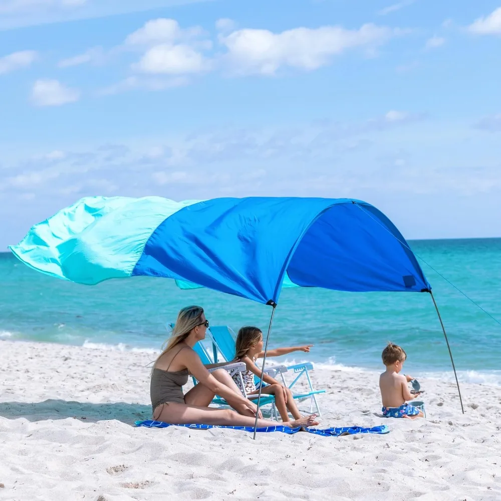"Mini Beach Shade: The Original Wind-Powered Canopy, Offering 75 Square Feet of Coverage"
"Mini Beach Shade: The Original Wind-Powered Canopy, Offering 75 Square Feet of Coverage"