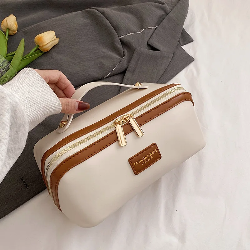 Fashionable PU Cosmetic Bag, Stylish Travel Toiletry Organizer for Women, Large Makeup Train Case & Carry-On Wash Bag
Fashionable PU Cosmetic Bag, Stylish Travel Toiletry Organizer for Women, Large Makeup Train Case & Carry-On Wash Bag